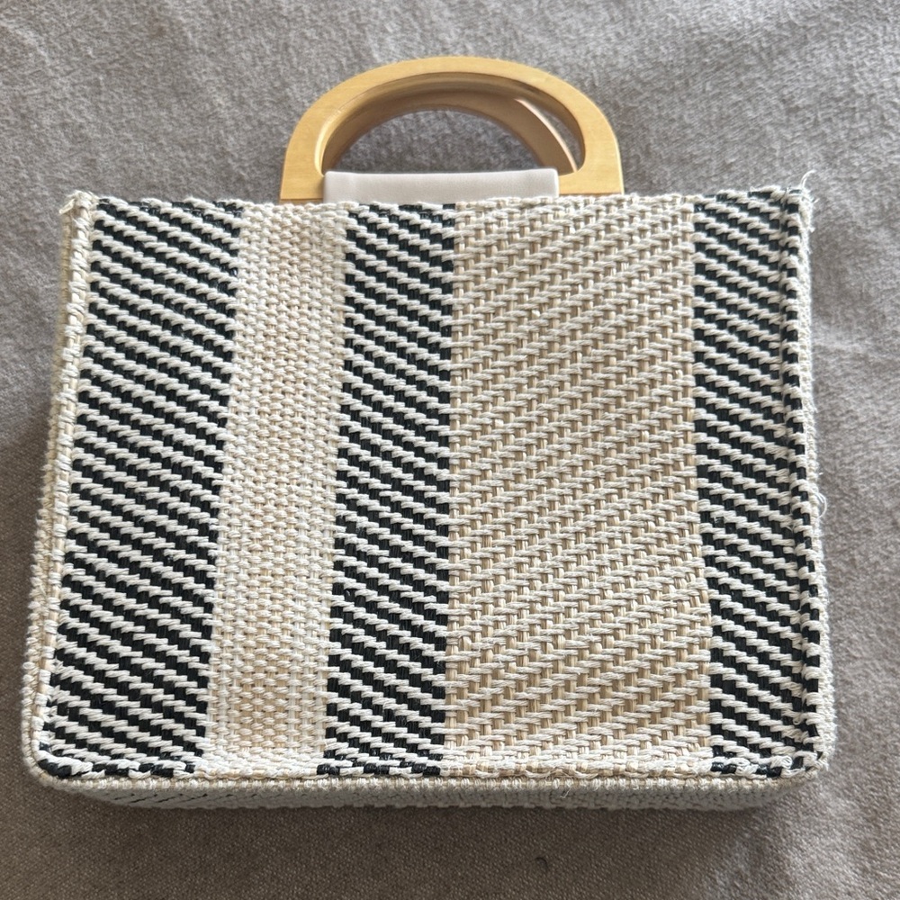 Elegant Black and Cream Tote with Wooden Handle